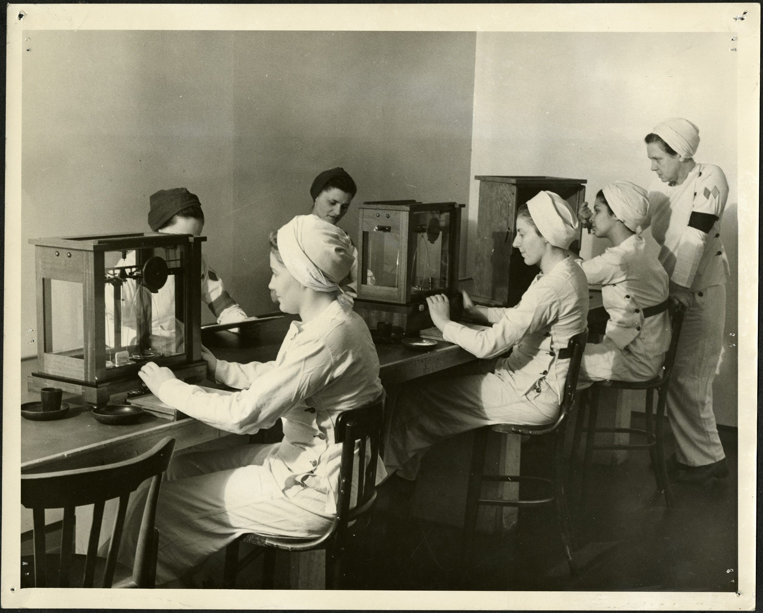 Women working at the General Engineering Company (Canada) munitions factory